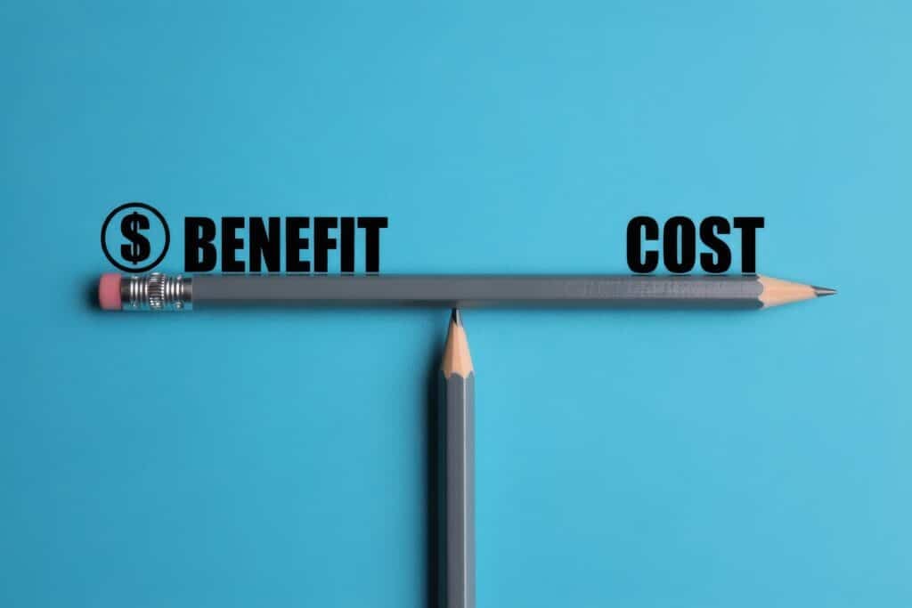 Balancing benefit and cost. scale made from pencils. AI generated image.